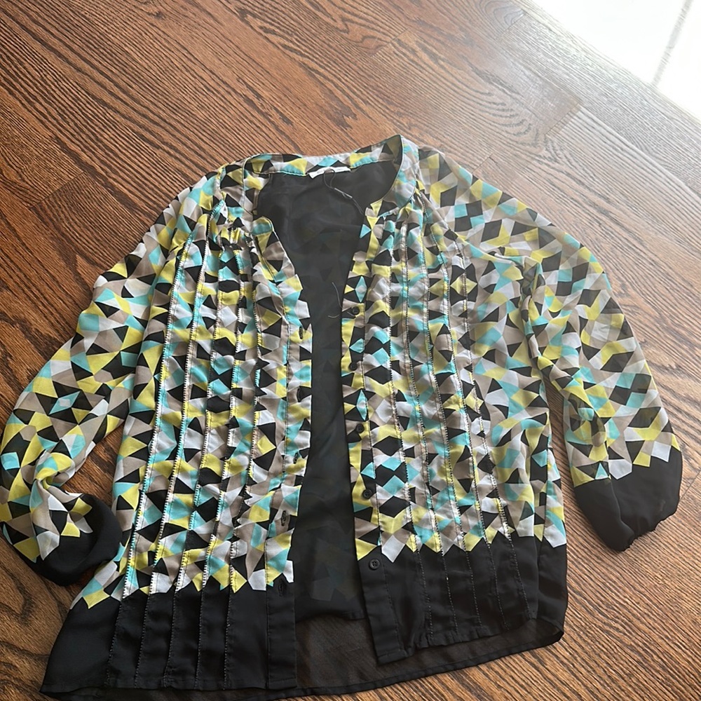 Calvin Klein size XS but fits a Small.